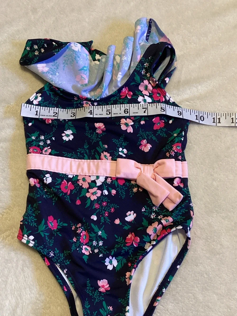 Janie and Jack Navy Floral One-Piece with Pink Bow Belt